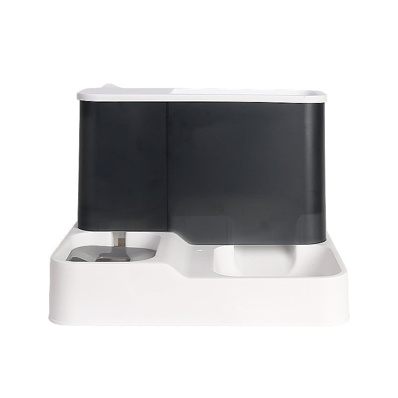 Grey and white gravity pet feeder with food hopper and water bottle