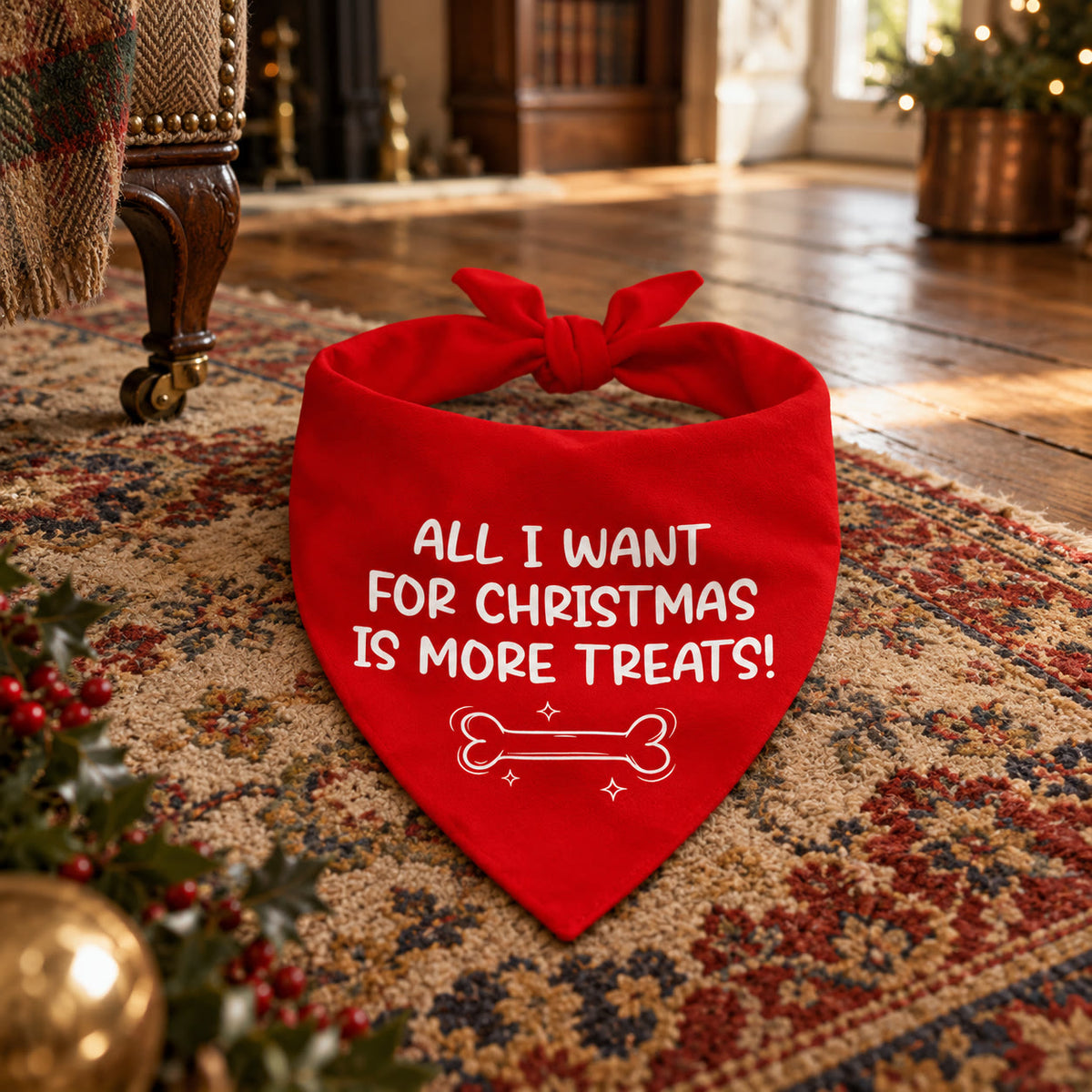 Red Christmas dog bandana reading All I want for Christmas is more treats - styled in a country-house interior