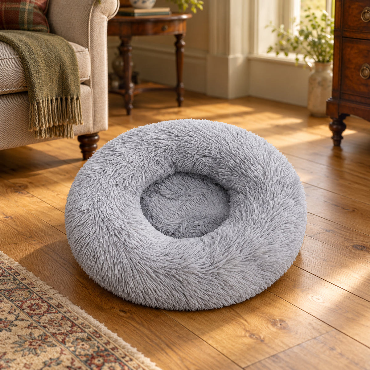 Grey 60 cm round faux-fur pet bed - styled in a country-house interior